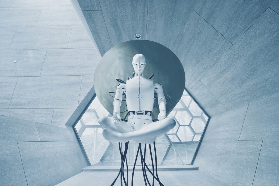 a white humanoid robot sitting cross-legged in a futuristic setting